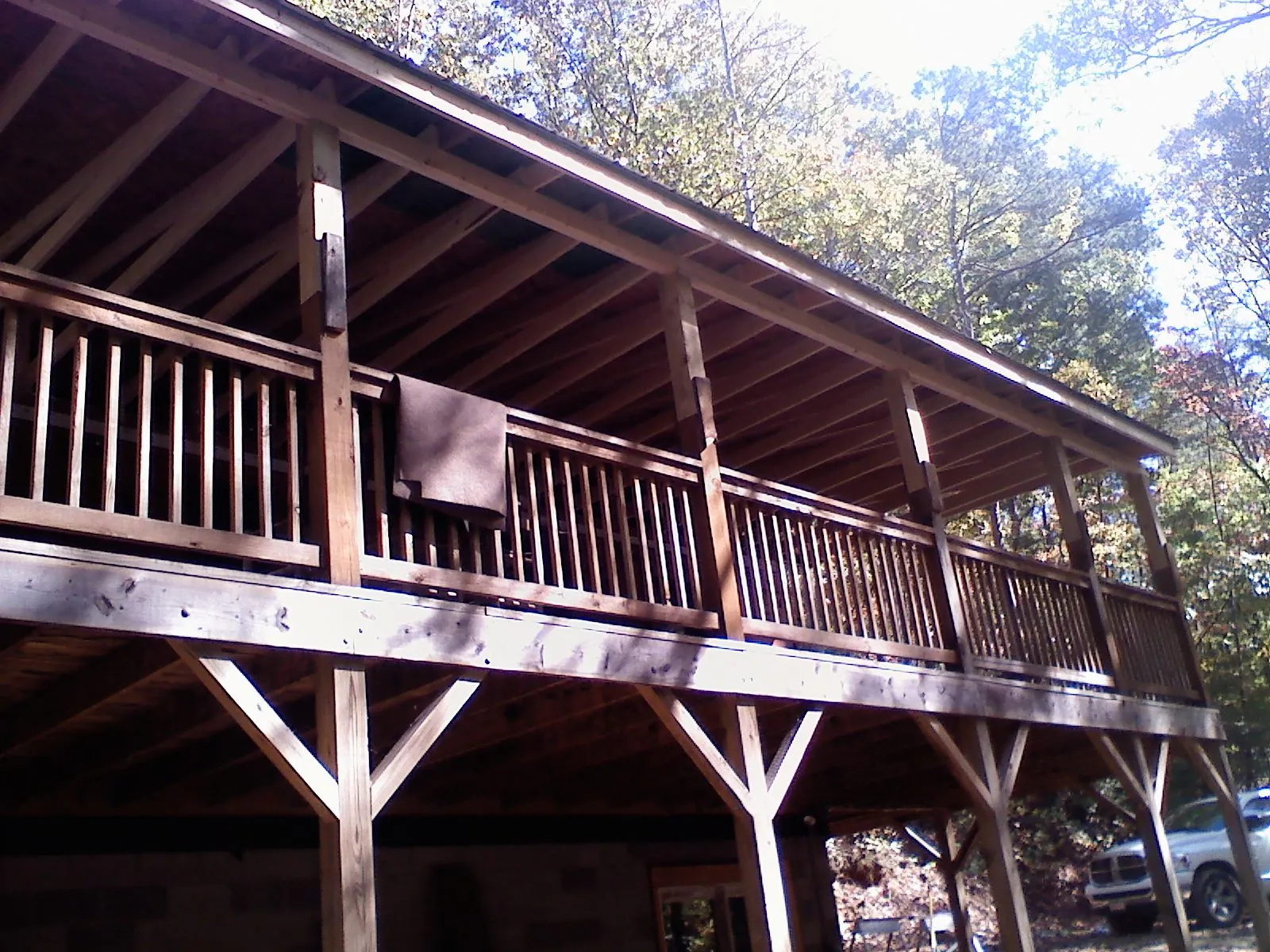 Timber framing under a new elevated porch and deck — Roof Leak Repair in Durham by Roofing Brothers
